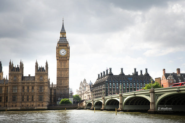 Iconic travel themed Image of London's Parliament, Clock Tower, Westminster Bridge and the River Thames. Charming travel themed art.
