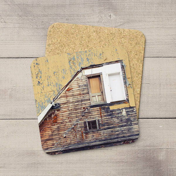 Photo coasters of a ramshackle door on an abandoned building in Yukon. Home accessories by Edmonton based photographer & artist, Larry Jang