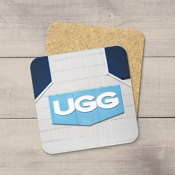 Photo coasters featuring United Grain Growers logo as photographed from aside of a grain elevator by Larry Jang.