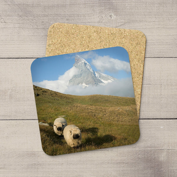 Photo Coaster of a cute pair of sheep running by the Matterhorn in Switzerland by Larry Jang