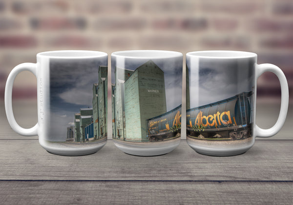 Big oversized Coffee Mugs featuring a wrap around image of grain elevator row and an Alberta Hopper car in Warner, Alberta. Great gift idea that celebrates Life in the Canadian Prairies. Handmade in Edmonton, Canada by photographer & artist Larry Jang.