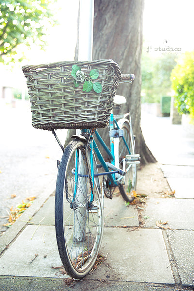 Fine art print of an azure blue bike parked in a charming village in England. Bicycle photography.