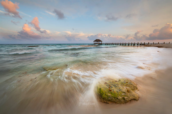 Photograph of crashing waves from Caribbean Sea crashing beach shores Playa del Carmen. The Fives Azul Beach Resort.