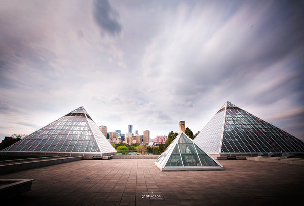 Image of Iconic Muttart Conservatory in Edmonton framing the YEG Skyline.