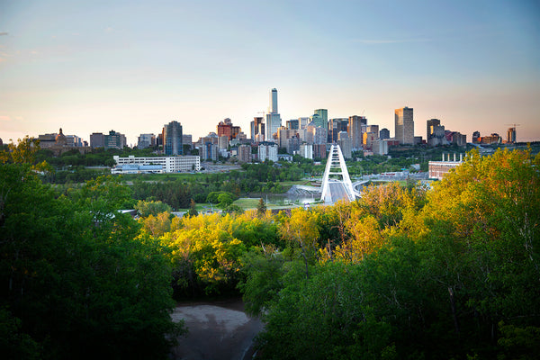 Autumn image of Edmonton City Skyline from Duggan Bridge. Walterdale bridge, Stantec Tower & JW Marriott hotel can be seen towering  over River Valley. Postcard images of YEG, Alberta by Larry Jang.