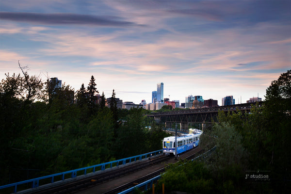 Art print of the Edmonton LRT transit crossing the North Saskatchewan River on Dudley Menzies beside High Level Bridge.. Best photography of Edmonton.