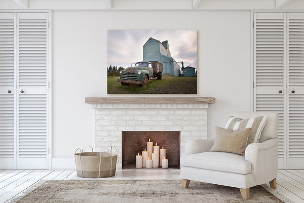 Canvas of a Ford Jalopy Truck in front of Andrew, Alberta grain elevator. Canadian Prairies decor for living room with a fireplace.