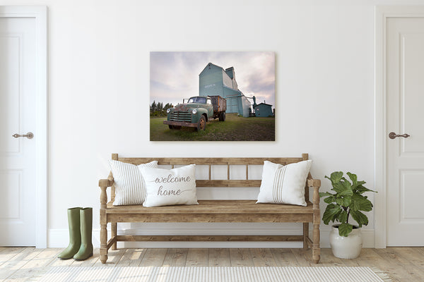 Canvas print of a rusty truck in front of grain elevator. Modern Farmhouse decor.