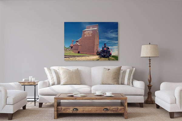 Canvas of a Train outside the Big Valley Grain Elevator hanging on a rustic modern living room. Wall decor ideas by Larry Jang