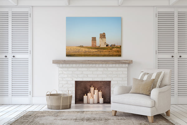 Gorgeous canvas print of Dankin Saskatchewan on display over a modern fireplace. Living room decor.