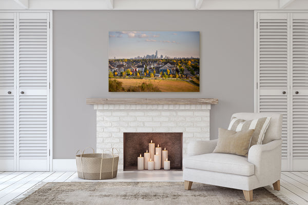 Canvas print of Edmonton & Griesbach on display in a living room with a fireplace.