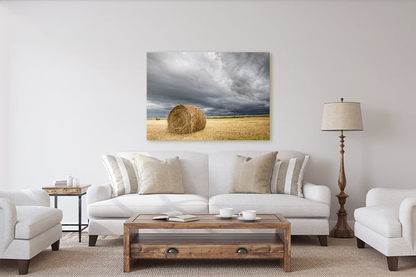 Rustic living room decor ideas. Canvas print of a hay bale in prairies.