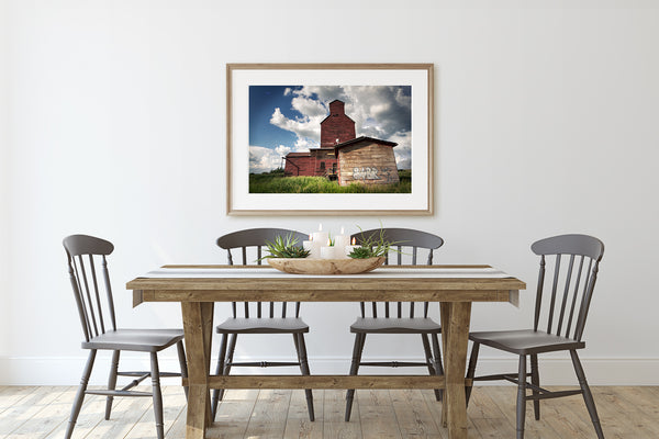 Picture of Grain Elevator hanging above rustic modern dining table.