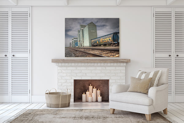 Alberta themed canvas art print on display on mantle of fireplace.