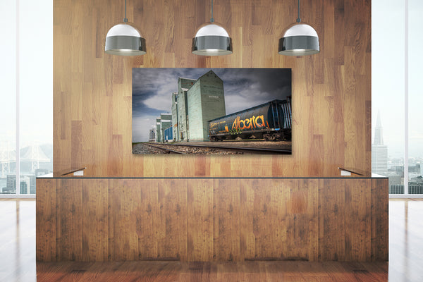 Alberta themed canvas print hanging in reception area of a modern office.
