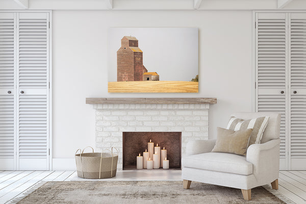 Canvas print of Warwick Grain Elevator hanging above mantle of fireplace. Rustic Modern Living Room decor.