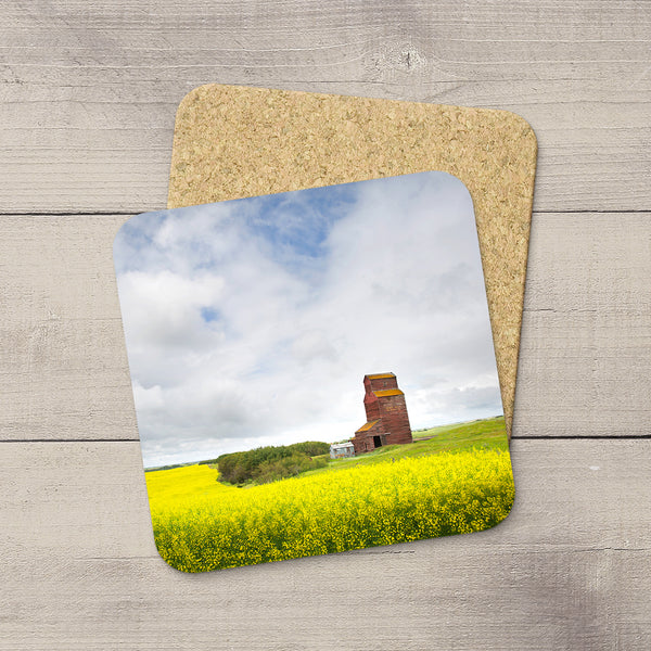 Photo coasters of a canola field and Grain Elevator in Canadian Prairies by Larry Jang.
