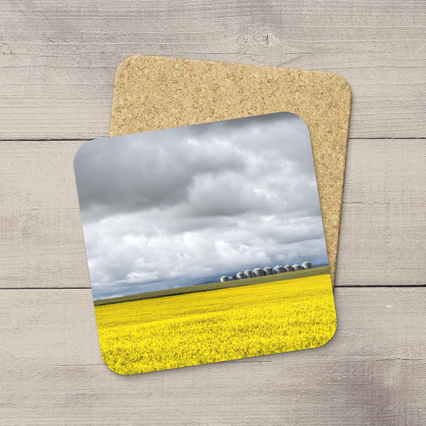 Drink Coasters of a canola field, grain silos and an incoming Alberta Storm by Larry Jang