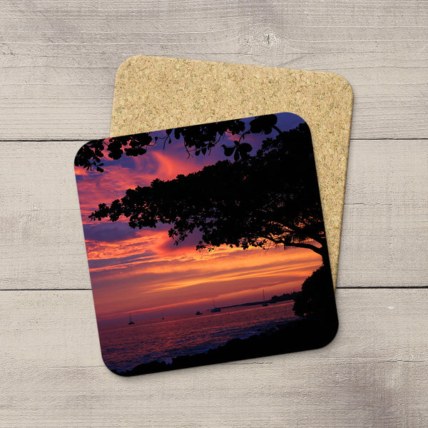 Photo Coasters of a beautiful Hawaiian sunset framed by a Koa tree in Kona, Big Island, USA. Souvenirs & travel themed home accessories. Handmade in Edmonton, Alberta by Canadian photographer & artist Larry Jang. 