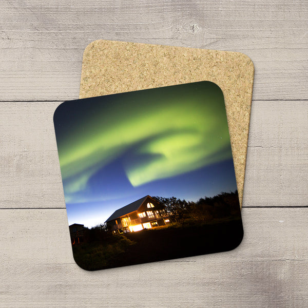 Photo Coasters of Northern Lights curving over a house in Iceland. Souvenirs of Aurora Borealis by Canadian Photographer, Larry Jang.