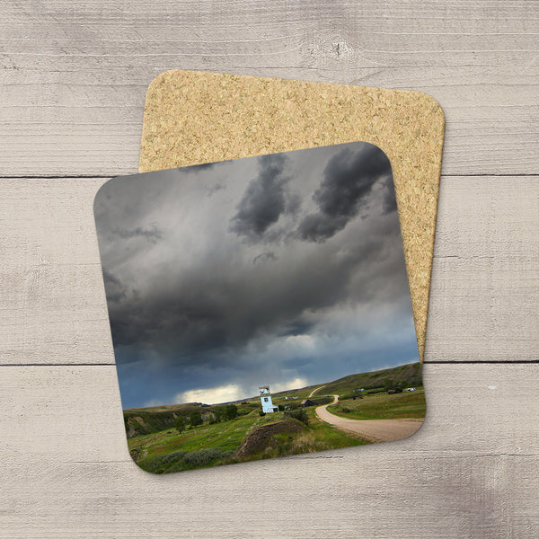 Drink Coasters of prairie road leading straight into a summer storm near Carbon Alberta  by Edmonton based photographer, Larry Jang.