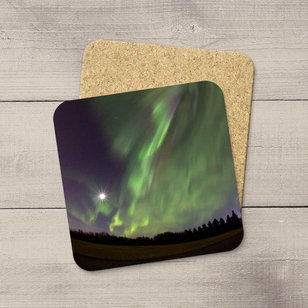Photo Coasters of Northern Lights dancing in a moonlit sky. Souvenirs of Aurora Borealis by Canadian Photographer, Christina Jang.