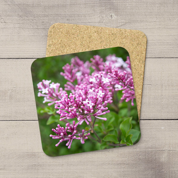 Image of lilac flowers hand printed on drink coasters by Edmonton photographer Larry Jang.