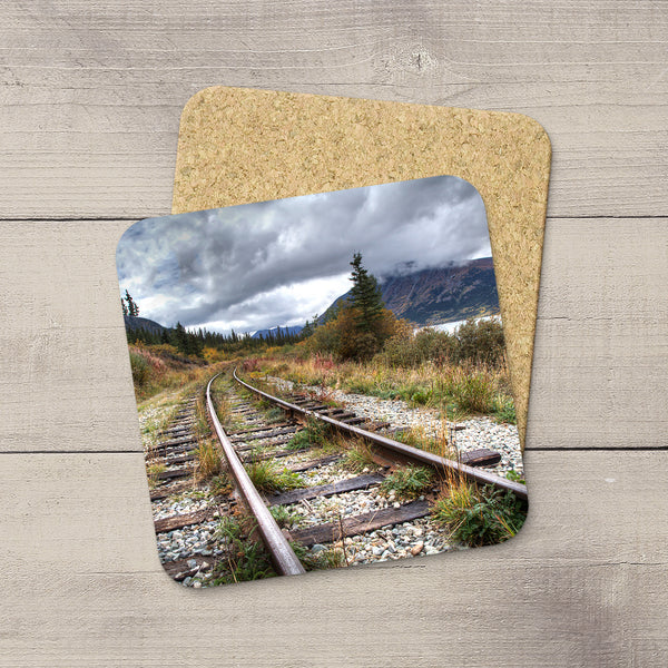 Drink Coasters of Railroad Tracks in mountains of Yukon Territory, Canada.  Souvenirs of Carcross. Handmade in Edmonton, Alberta by Canadian photographer & artist Larry Jang.