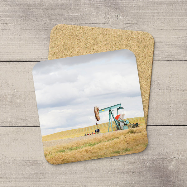 Drink Coasters of an aquamarine oil pump jack in Southern Alberta. Home accessories by Larry Jang