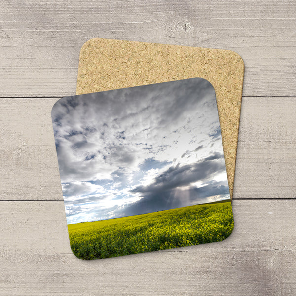 Photo coasters of a canola field and rays of sunlight beaming down onto the Canadian Prairies. Home accessories by Edmonton based photographer & artist, Larry Jang