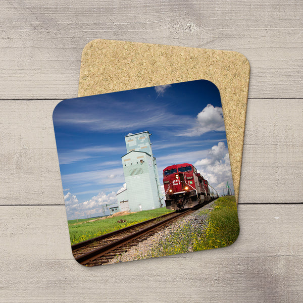 Drink Coasters of CN locomotive driving pst Innisfail by Larry Jang