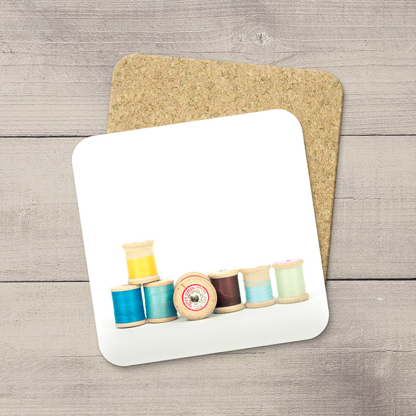 Sewing Room Accessories Ideas. Beverage Coasters featuring a picture of Vintage & Colorful wooden thread spools. Modern functional table decor by Edmonton artist & photographer. 