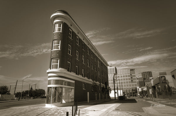 Gibson Block is a vintage inspired art print of the triangular flatiron building in the Quarters district of Edmonton.