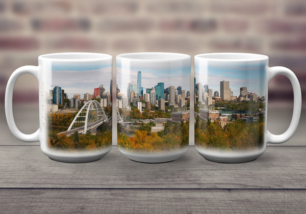 Big oversized Coffee Mugs featuring a wrap around image of the City of Edmonton skyline in the fall. Includes Walterdale Bridge, River Valley & Stantec tower. Great gift idea that celebrates Life in the Canadian Prairies. Handmade in Canada by photographer & artist Larry Jang. Unique souvenirs.