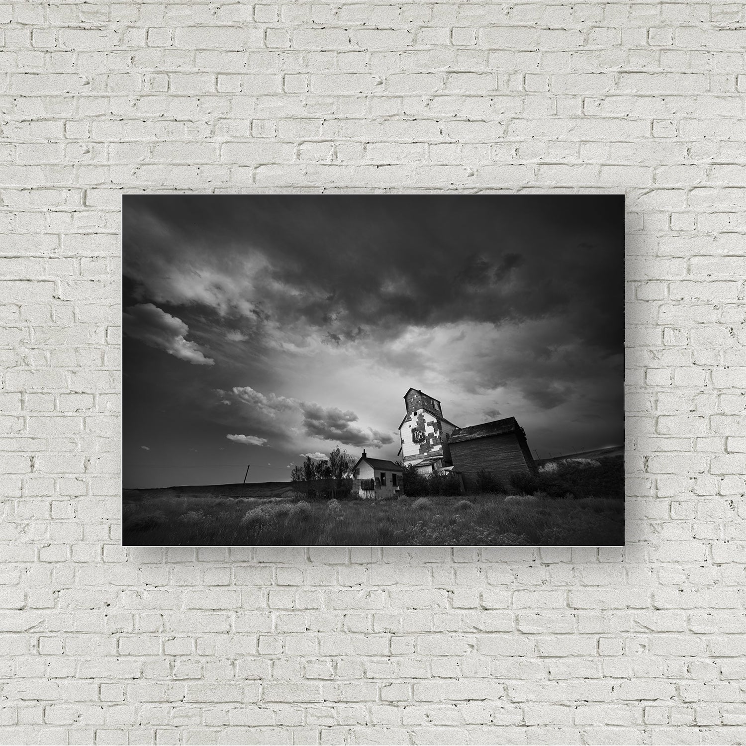 Black and White Art Print of Storm Clouds forming Over Grain Elevator in Alberta Badlands