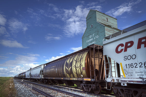 Image of a train rolling into the Ghost Town of Brant. Canadian Prairies Photography.