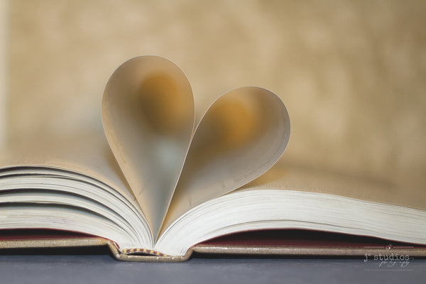 Book of Love is an art print dedicated to readers. Heart shaped.