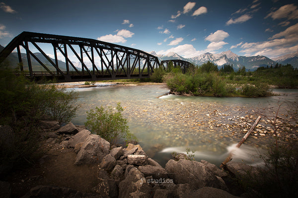 Image of a Train Trestle spanning the Athabasca River in Jasper National Park. Rugged Heritage inspired photography.