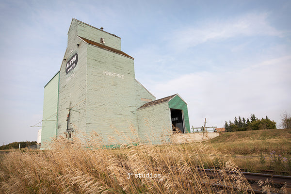 Fine art photograph of the remaining grain elevator in Innisfree Alberta. Alcor. Canadian Prairies.