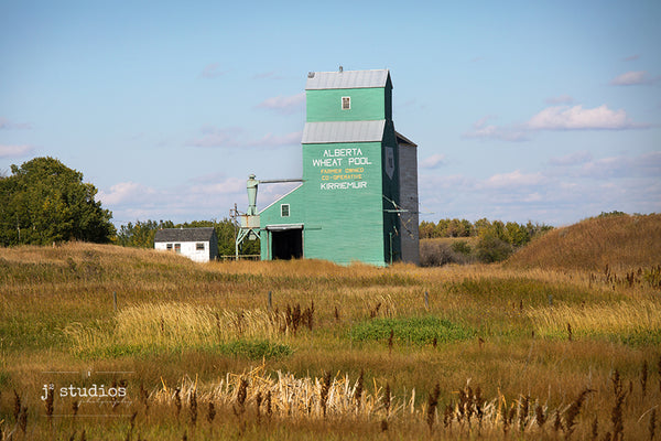 Love this beautiful grain elevator nestled in the valley surrounded by gorgeous fall colors. A definite love where you live moment! Canadian prairies photography. Kirriemuir.