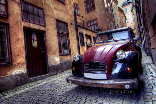 Old Town Charm is an art print of a European jalopy in Stockholm Sweden.