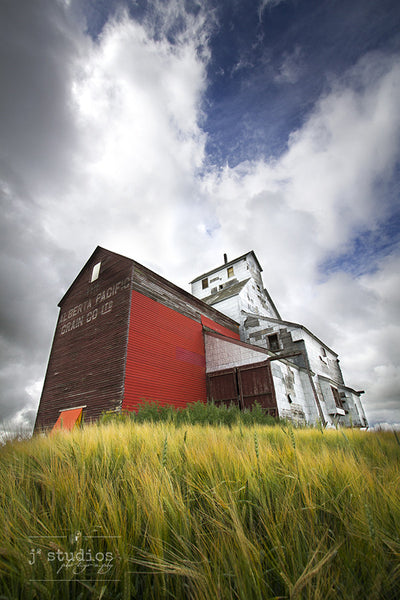 Art print of the majestic and old grain elevator in Raley, Alberta. Canadian Prairies Photography.