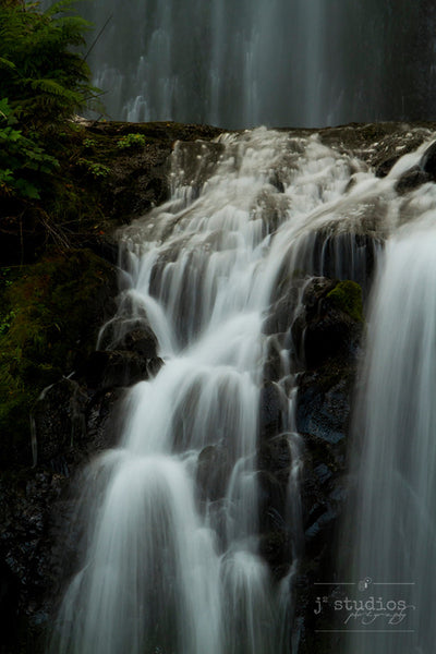 Rapids of Multnomah is an art print of cascading water flowing onto Lower Multnomah Falls.
