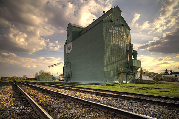 Sentinel on the Tracks is an image of the grain elevator in Leduc, Alberta. Photography of prairie architecture. 