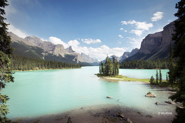 Postcard themed image of the iconic Spirit Island sitting in the turquoise waters of Maligne Lake in Jasper National Park, Alberta. Fine Art Print Home Decor.