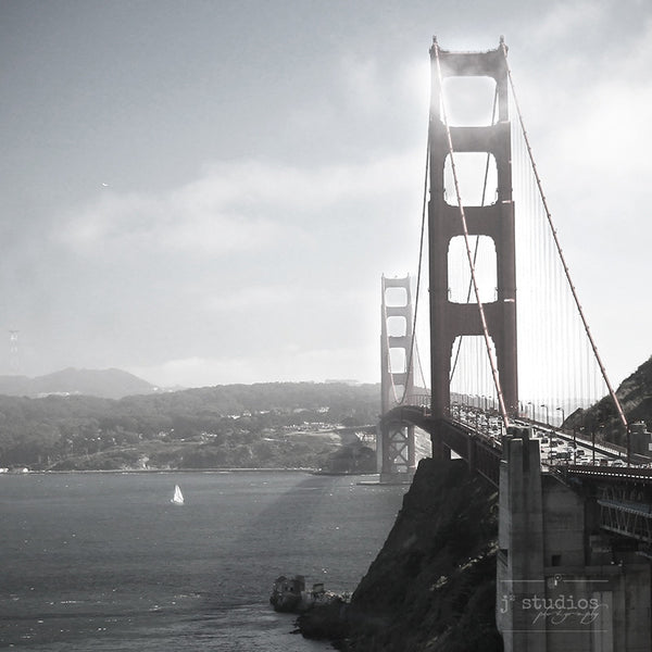 Golden Gate Bridge is a black and white photograph of the famous landmark in San Francisco.