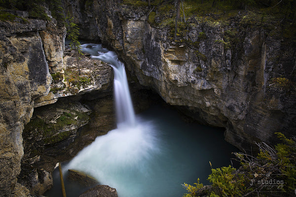 Stanley Falls is an photographic art print of a breath taking waterfall in Jasper National Park Canada. Landscape Photography.