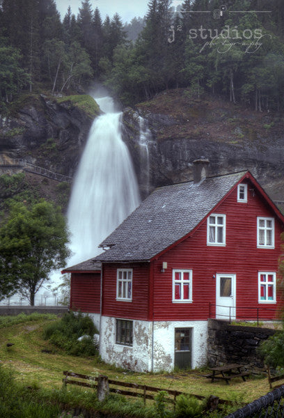 Steinsdal's House is an art print of a Norwegian red house with a waterfall view. Scandinavian Photography.