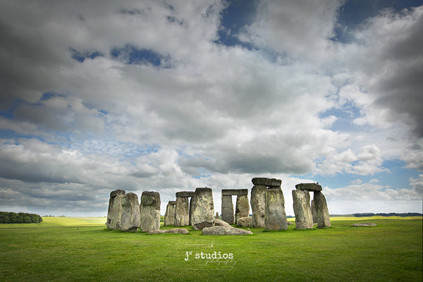 Timeless image of the famous prehistoric monument in Wiltshire, England. Iconic ring of standing stones ancient burial ground. English Heritage Photography.
