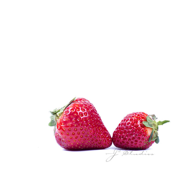 Strawberry Kisses is a minimalist inspired photograph of a fresh pair of red strawberries sitting cheek to check like lovers. Kitchen decor, Fruit art. Whimsical decor by J2 Studios